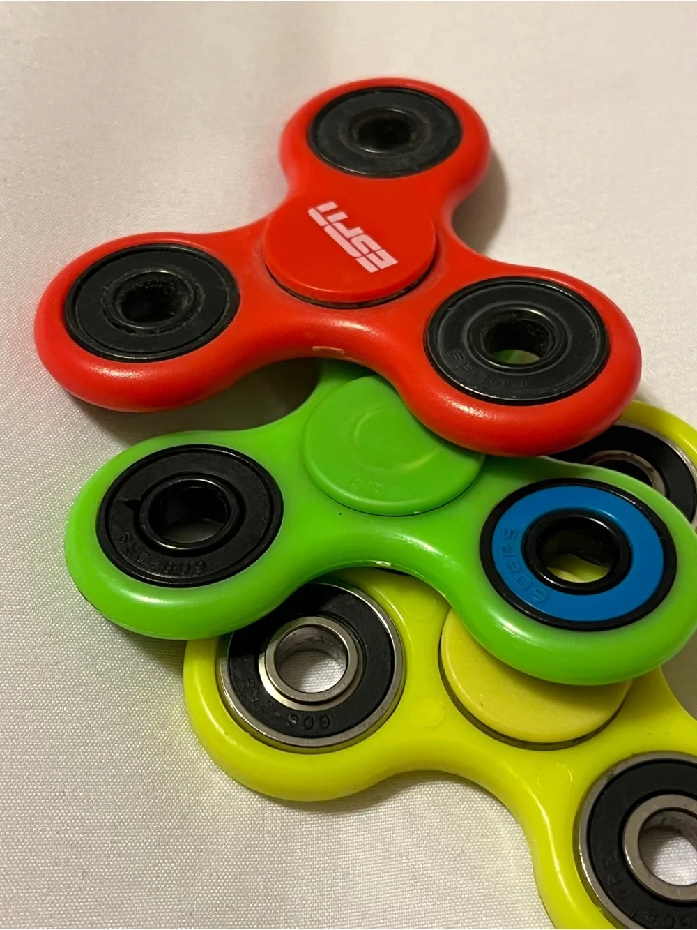 Lot of 3 Fidget Spinners ESPN Dish Network Plastic Toy Red Green Yellow